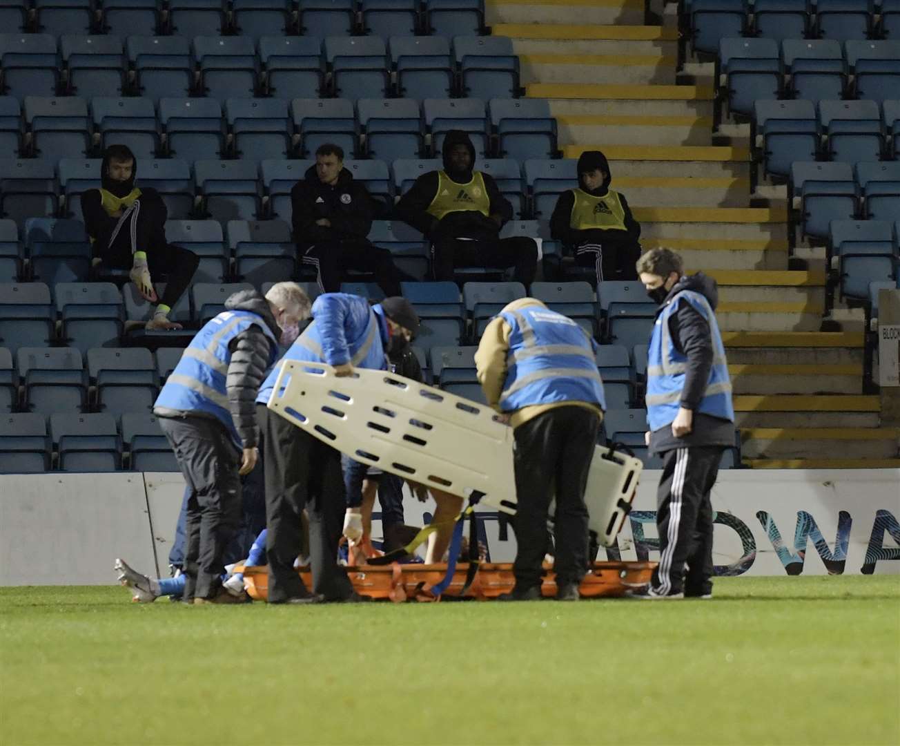 Striker Dominic Samuel is stretchered off Picture: Barry Goodwin