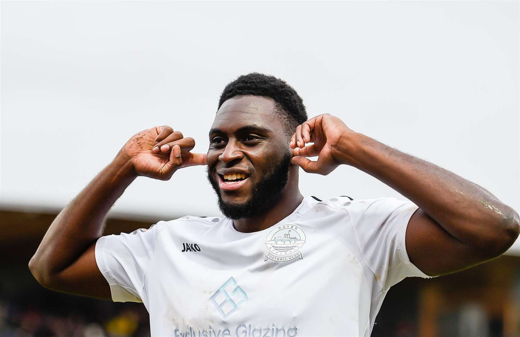 Striker Inih Effiong celebrates scoring his third and Dover's fourth in their 5-1 victory against AFC Fylde at Crabble on Saturday. Picture: Alan Langley