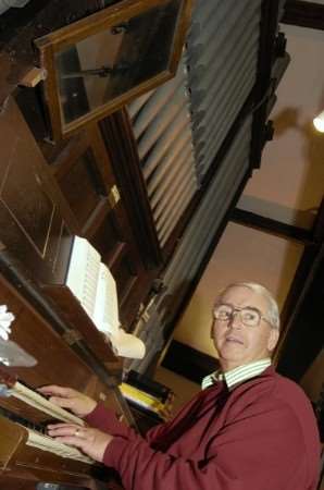Ray Moses playing the church organ
