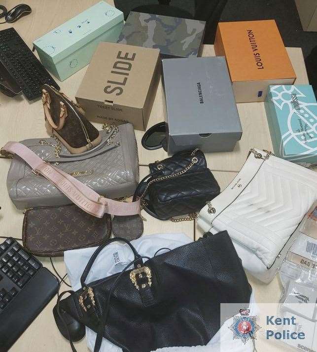 Balenciaga and Luis Vuitton products were amongst items seized by police in Hoo. Picture: Kent Police