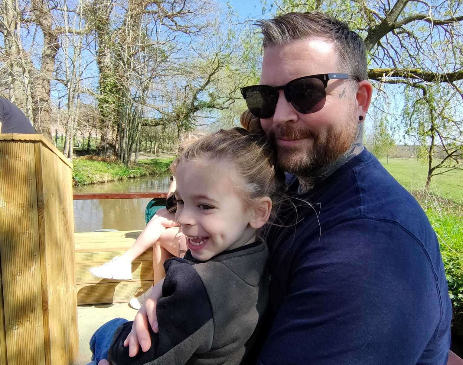 Leon Zanre, pictured with son Abel, has been told by medics that it could be years until he can walk properly again following the crash. Picture: Leon Zanre