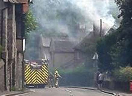 Fire crews tackle the blaze at Linton Hill. Picture: @Kent_999s