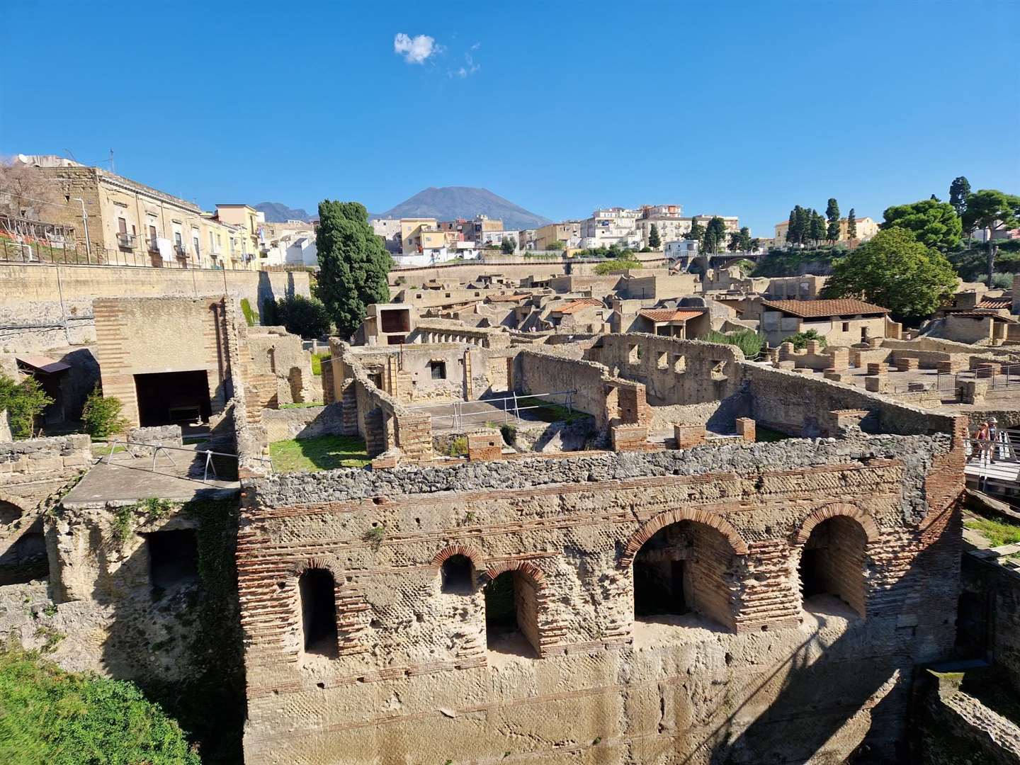 The town on Herculaneum - consumed in AD79 when Vesuvius (which looms in the background) erupted