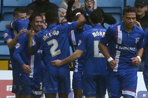 Gillingham celebrate their second goal in 11 minutes against Bradford on Saturday Picture: Barry Goodwin