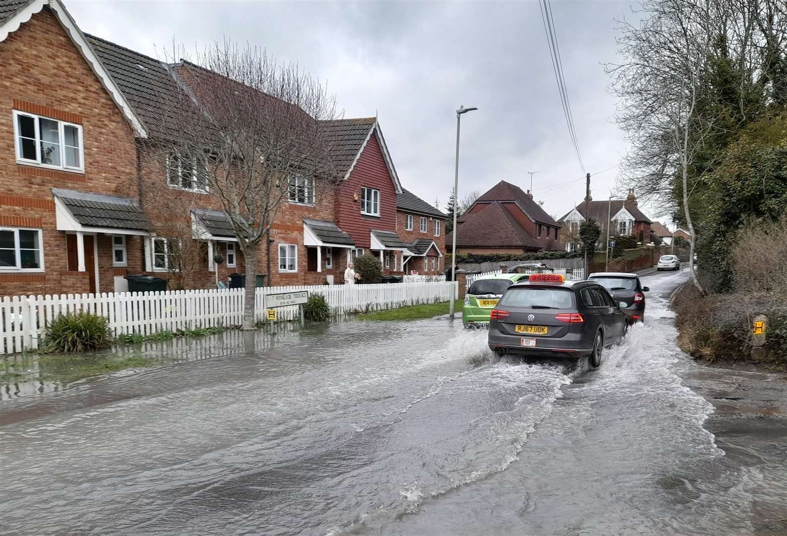 John Bailey says the water is "endangering" houses in the road. Picture: John Bailey