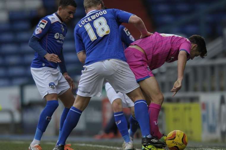 Connor Smith looks to keep possession against Oldham Picture: Barry Goodwin