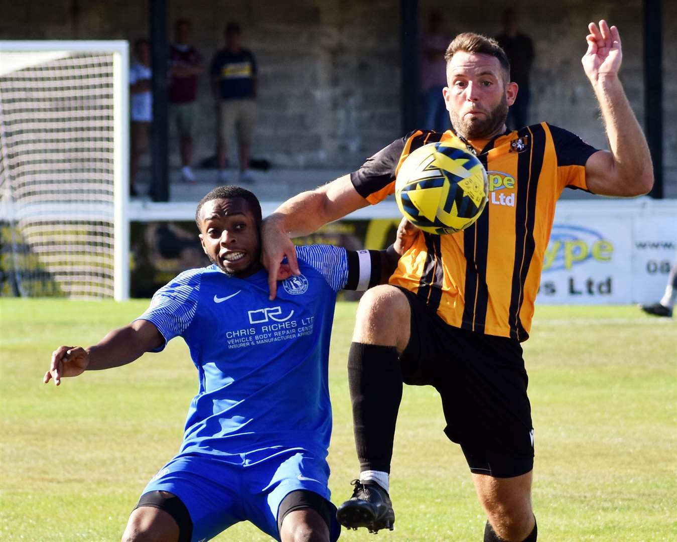 Folkestone's Josh Vincent and Herne Bay's Kieron Campbell battle it out in Bay's 2-1 defeat at Cheriton Road. Picture: Randolph File
