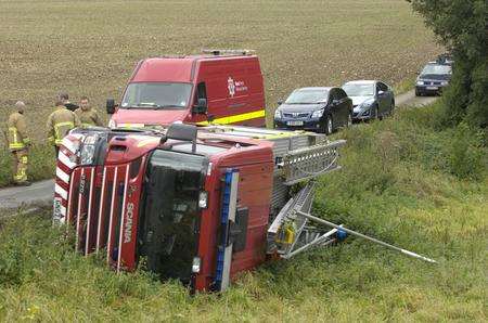 Overturned fire engine in Stalisfield country lane