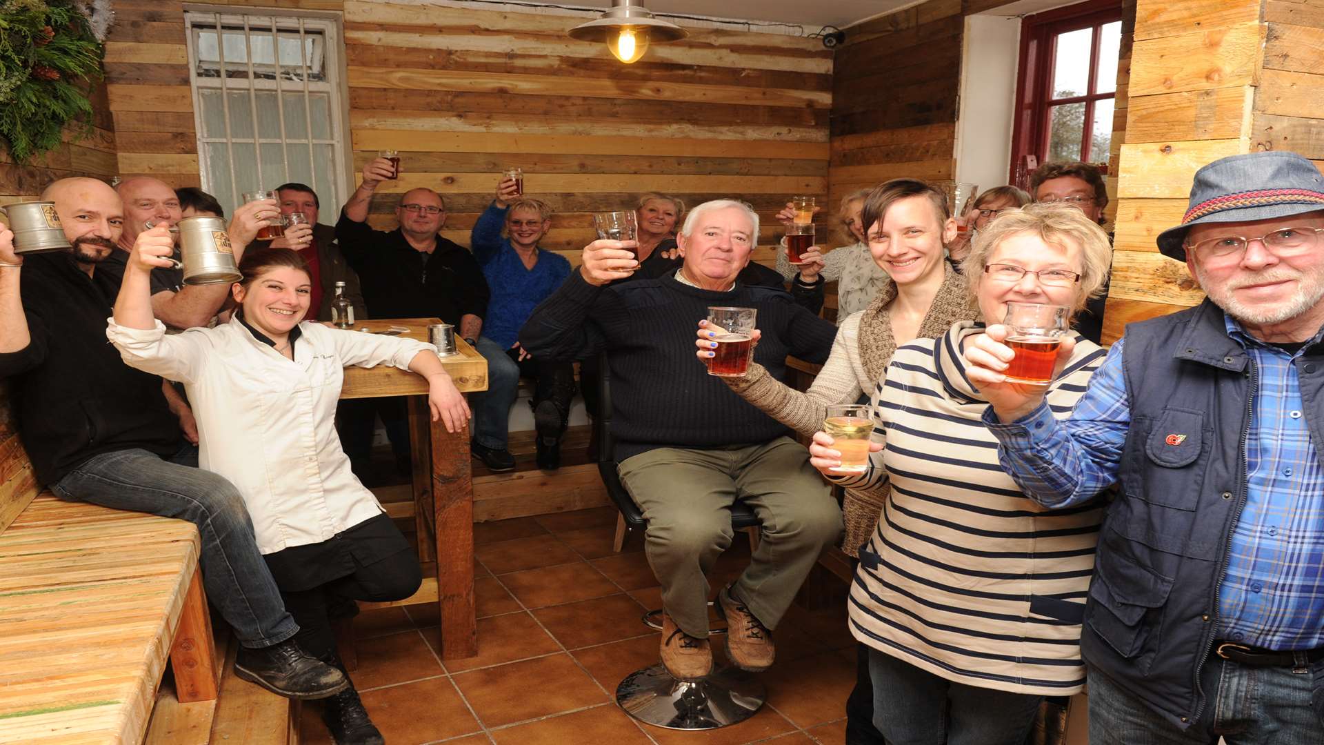 Happy punters at the Flippin' Frog, with owners Melanie Royer and Cyril Cypres on the left. Picture: Steve Crispe