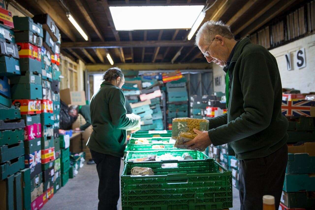 Volunteers unload supplies at a Trussell Trust foodbank