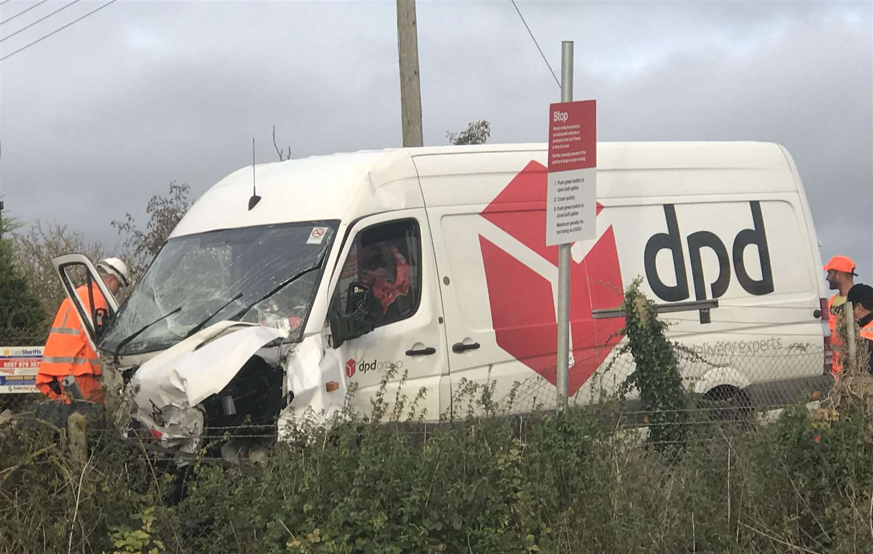 The damaged van after the collision at Frognal Farm level crossing in 2017