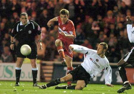 Chris Perry challenges James Morrison, the scorer of Boro's second goal. Picture courtesy Middlesbrough Evening Gazette