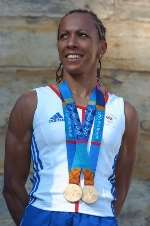 DOUBLE: Kelly with her Olympic gold medals