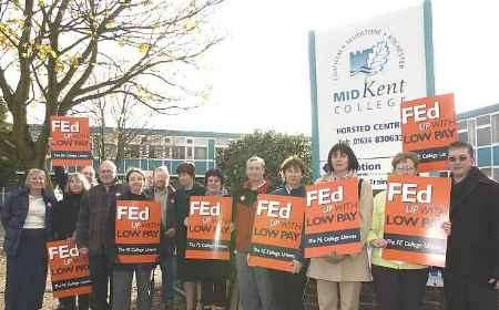 TAKING ACTION: Pickets outside Mid Kent College. Picture: JOHN WARDLEY