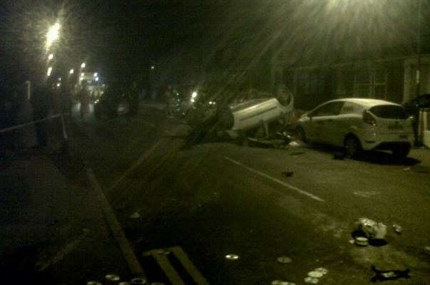 The overturned car in Napier Road, Gillingham