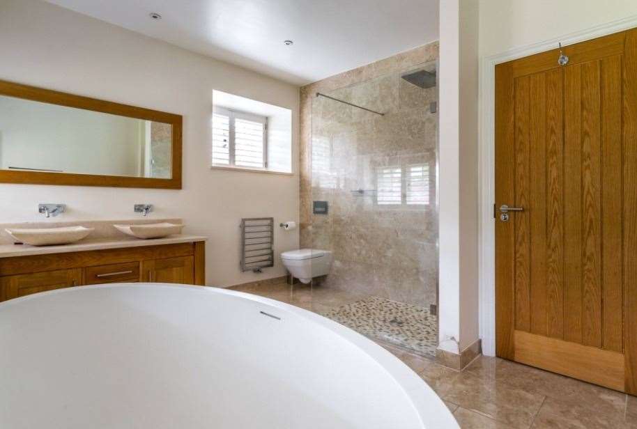 There are five bathrooms, including two en-suites. Picture: Hamptons