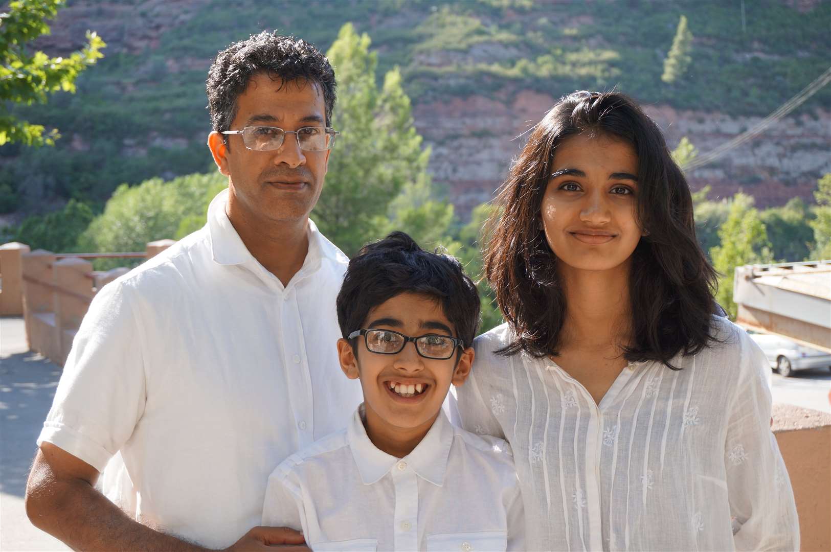 Rohan Godhania (centre) with his parents Pushpa and Hitendra Godhania in Barcelona in 2015 (Family Handout/PA)