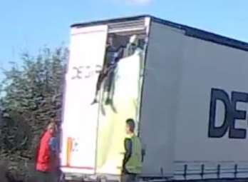 Dashcam footage shows suspected migrant in lorry