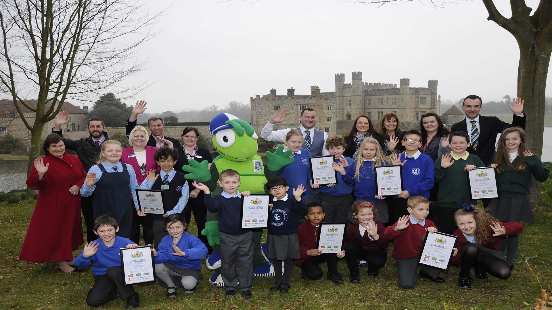 Walk to school district champions celebrate with mascot Buster Bug and key partner organisations from KCC, Medway Council, 3R's, Specsavers, Mini Babybel, Countrystyle, and Golding Vision (part of Golding Homes).
