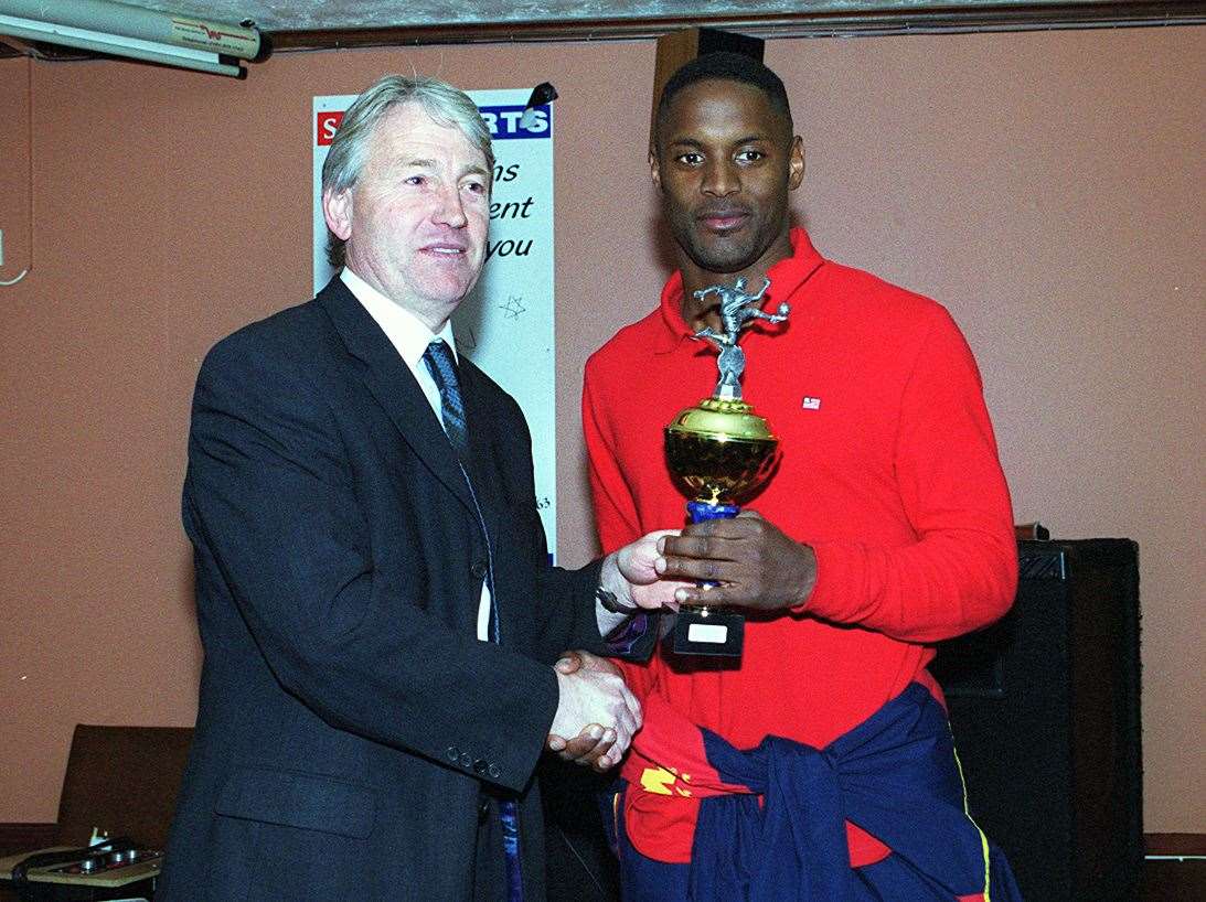 Leon Bratihwaite, Margate's scorer at Boston, receives the 01/02 player of the year award from manager Chris Kinnear