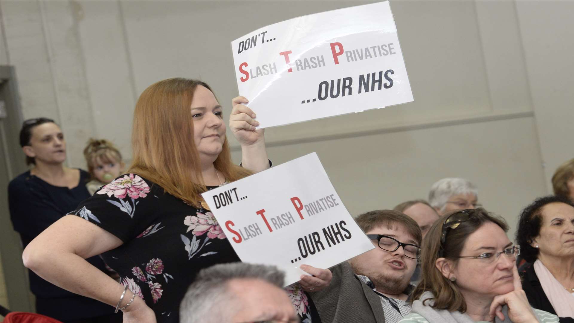 Campaigners for health services at a public meeting in Canterbury.