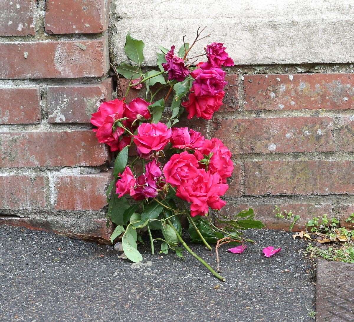 Flowers have been left at the scene. Picture: UKnip (36531208)