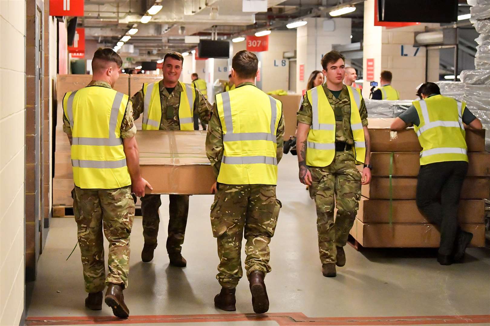 The British Army help move medical supplies at the Principality Stadium, Cardiff (Ben Birchall/PA)