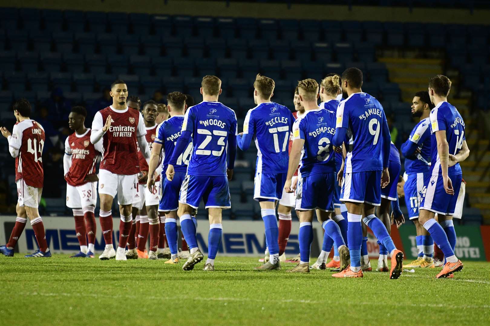 Gillingham players congratulate the Arsenal side on their victory Picture: Barry Goodwin