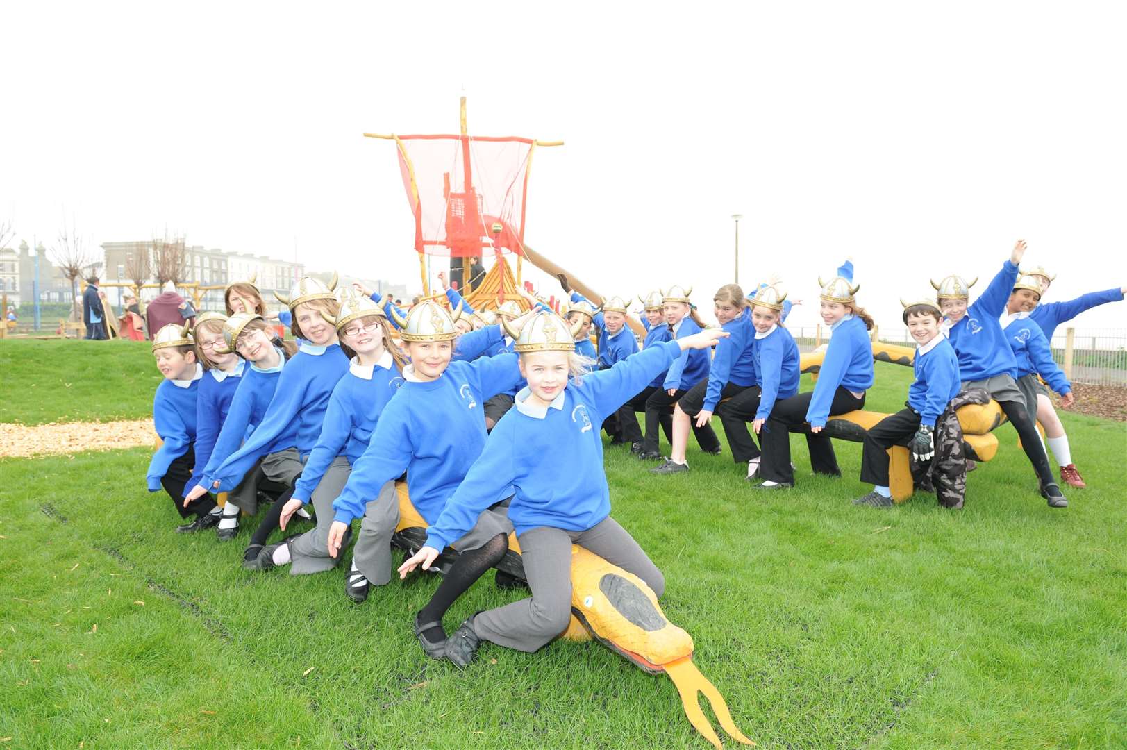 Youngsters from Cliftonville Primary School trying out the giant balancing snake at the area's new Viking-themed playground when it opened in 2009