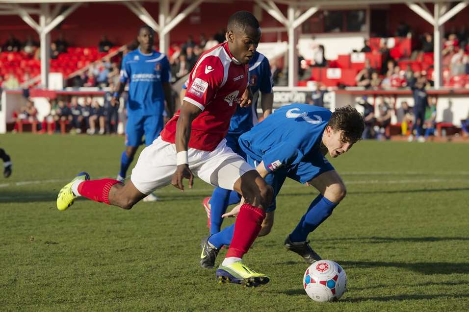 Anthony Cook skips past Hayes & Yeading's Adam Everitt Picture: Andy Payton