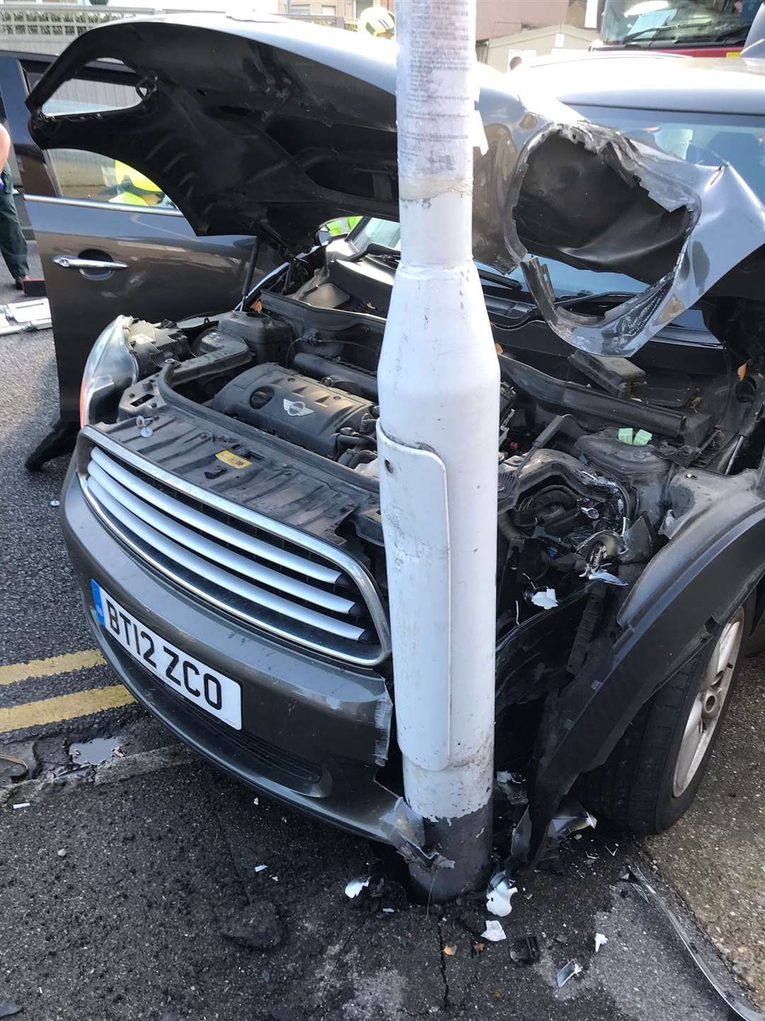 The remains of the Mini Clubman after it crashed into a lamppost outside Blackburn Lodge in Sheerness Broadway