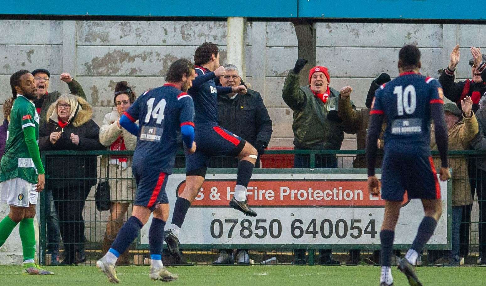 Jack Evans celebrates after putting away his penalty for Chatham. Picture: Ian Scammell