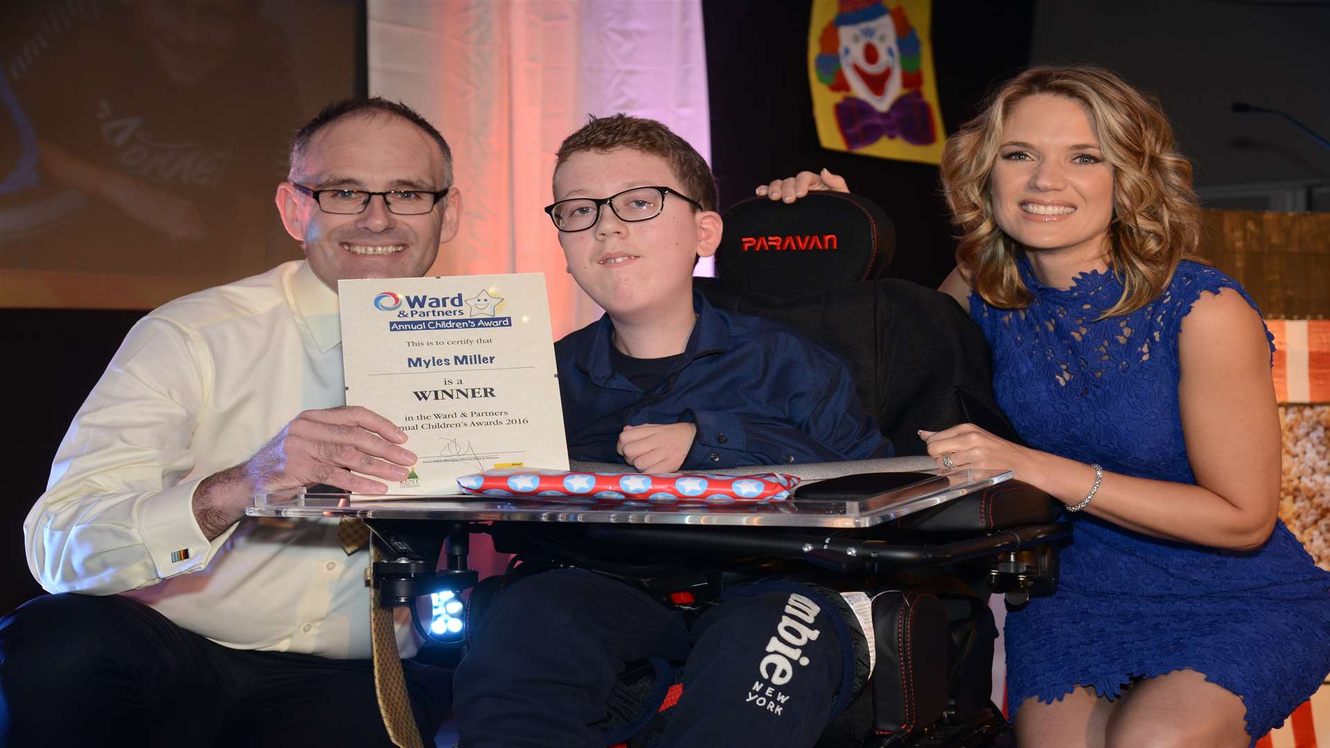 Charlotte Hawkins and Arun Estates Lettings Director Jason Bunning presenting the Going For Gold award to Myles Miller at last year's awards