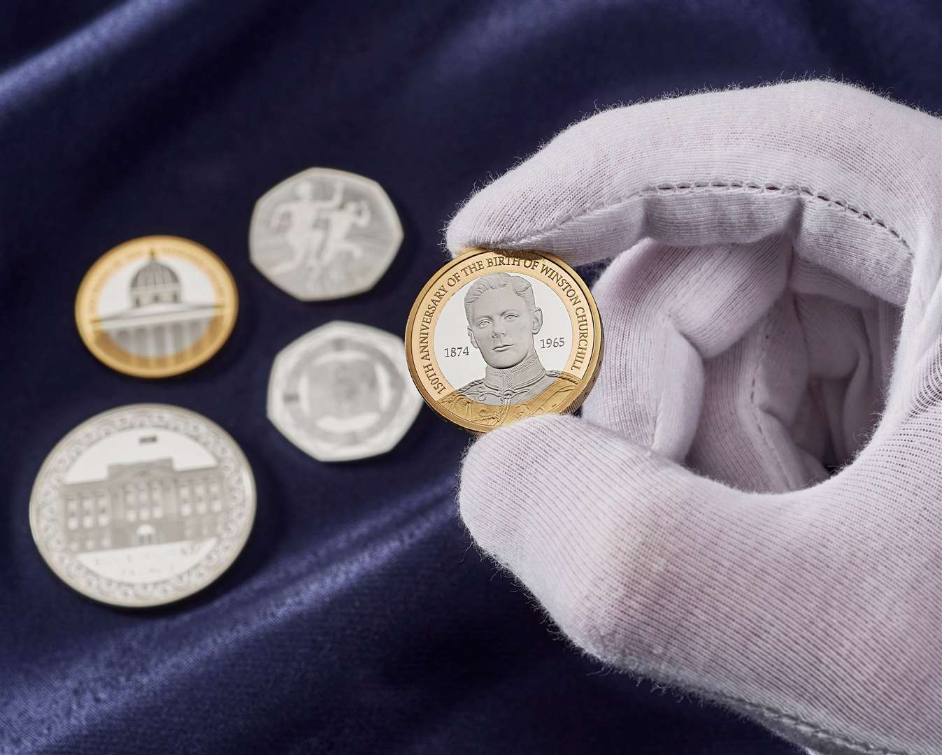 A £2 coin marks the 150th Anniversary of the Birth of Sir Winston Churchill. A portrait depicts Churchill as a young man in 1895, wearing the uniform of the 4th Queen’s Own Hussars. Designed by Natasha Seaward, the edge inscription writes, “Pave the way for peace and freedom,” a remark Churchill made whilst serving his second term as prime minister. Picture courtesy of Royal Mint