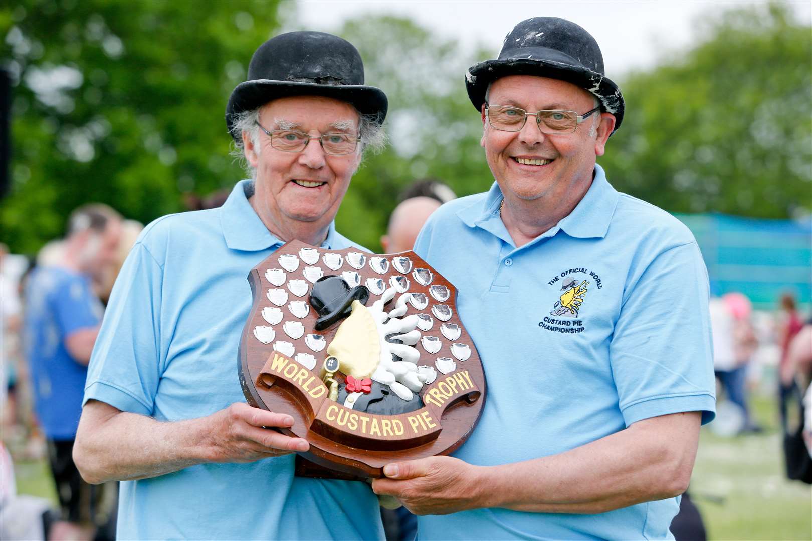 Brian Mortimer with friend Mike FitzGerald holding the Custard Pie Trophy