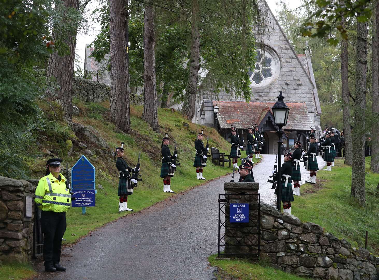The Royal Regiment of Scotland form a guard of honour as the Queen arrives at Crathie Kirk last year (Andrew Milligan/PA)