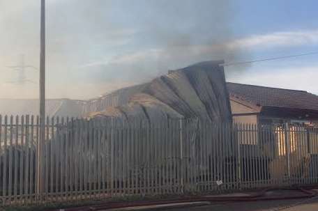 Smoke from the badly-damaged building in Botany Road, Northfleet. Picture: Thom Morris