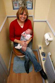 Nan, Glynis Statham (cor) with her grandaughter. Teresa Linsdell gave birth to her baby in the toilet for the second time.