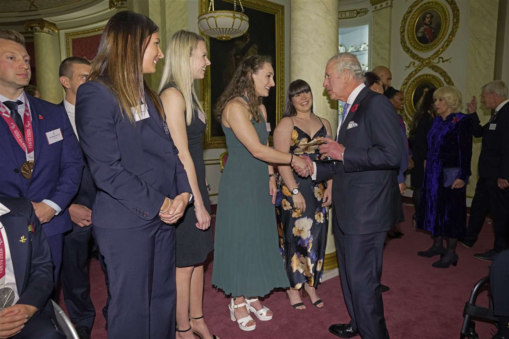 The King meets Olympic medallists, (left to right) Eve Muirhead, Vicky Wright, Jennifer Dodds and Hailey Duff (Kin Cheung/PA)