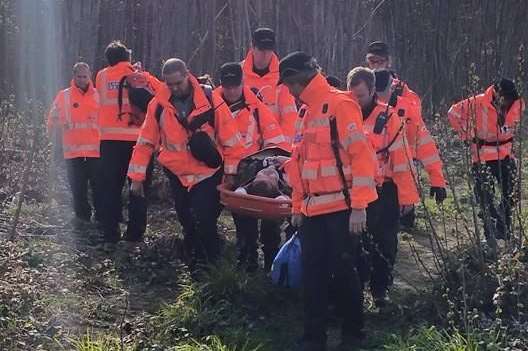 Library picture. A Kent Search and Rescue stock picture of casualty being conveyed by stretcher