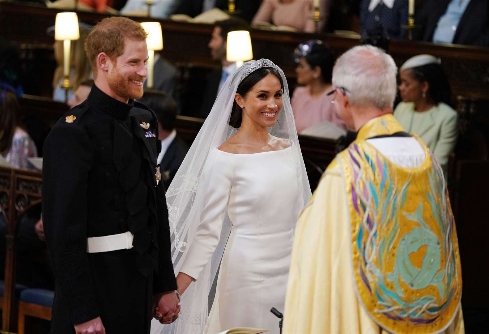 Harry and Meghan during their wedding ceremony at St George’s Chapel, Windsor Castle in 2018 (Dominic Lipinski/PA)