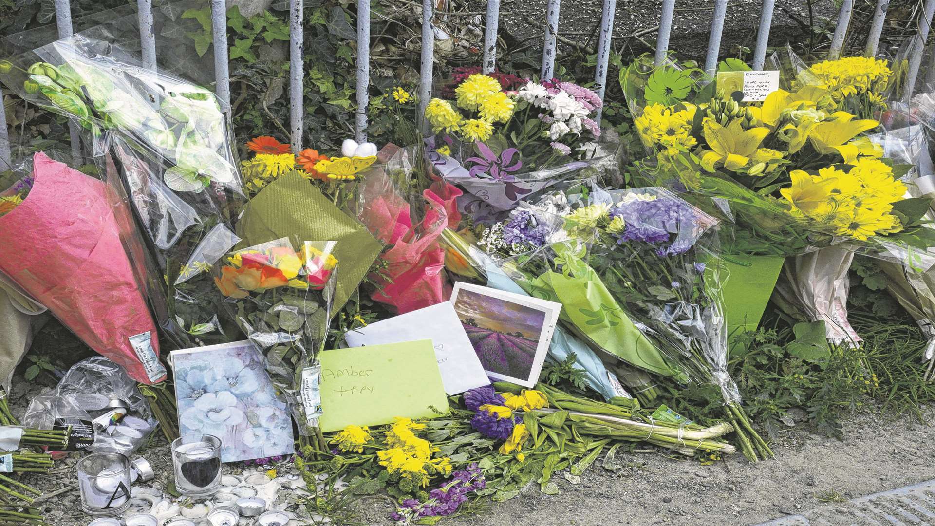 Floral tributes were left Teynham Railway Station