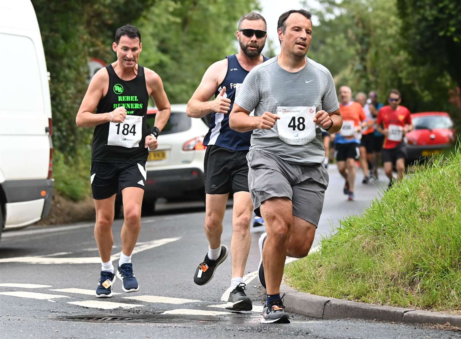 Nick Bryant (48) of Christ Church Runners and Michael Harvey (184) of Rebel Runners Medway. Picture: Barry Goodwin (49790399)