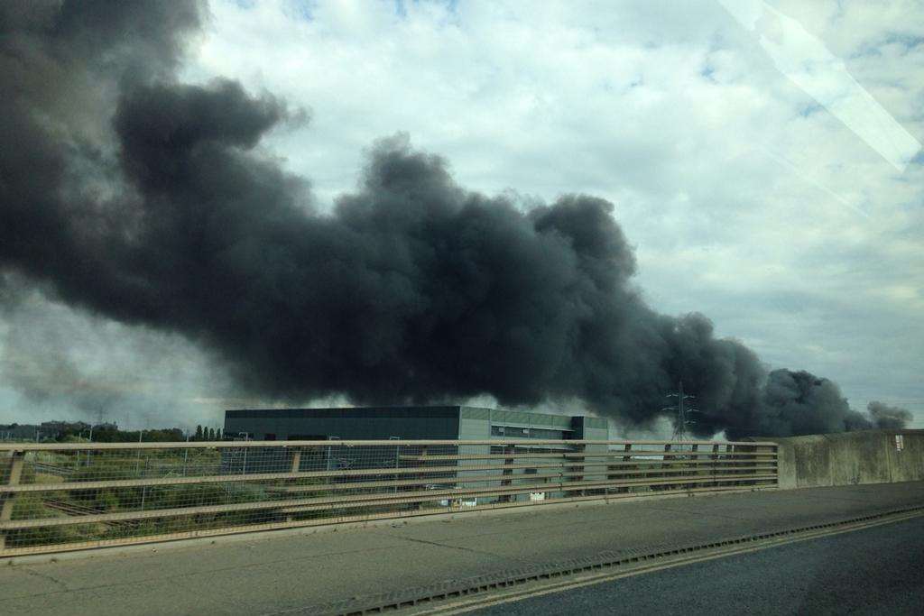 The giant plume of smoke can be seen from the A2