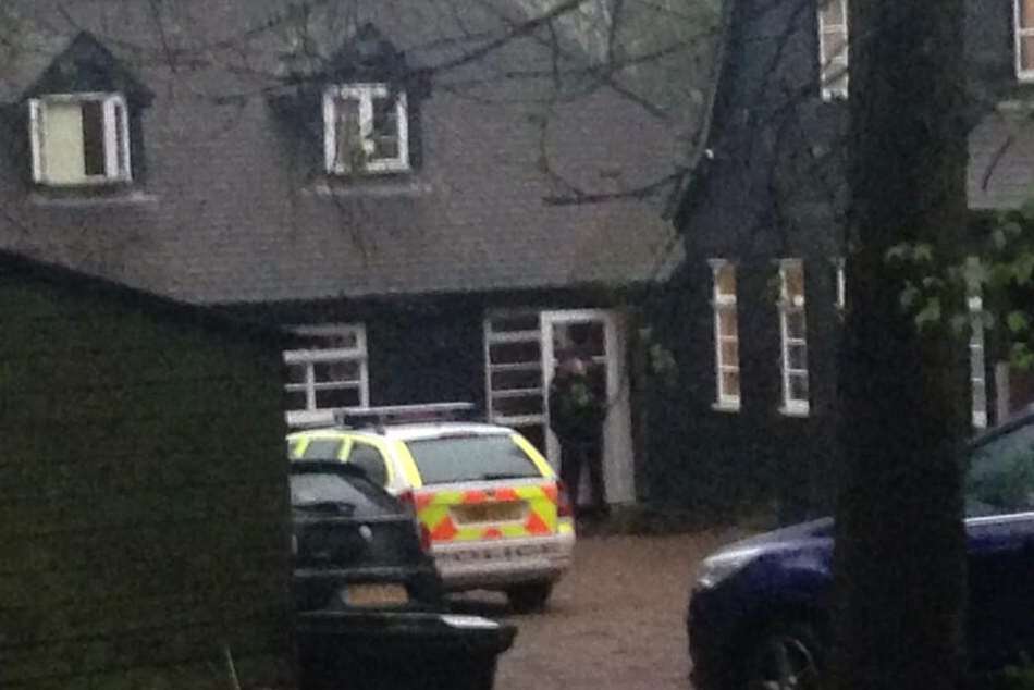 Police stand guard outside Peaches Geldof's house following her death