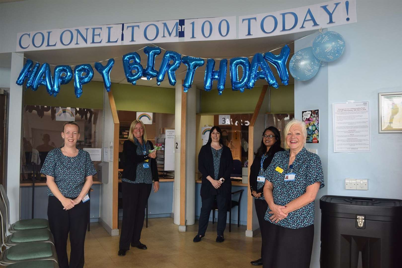 Staff at Darent Valley Hospital with their birthday banner for Captain Tom Moore. Picture: Darent Valley Hospital on Facebook