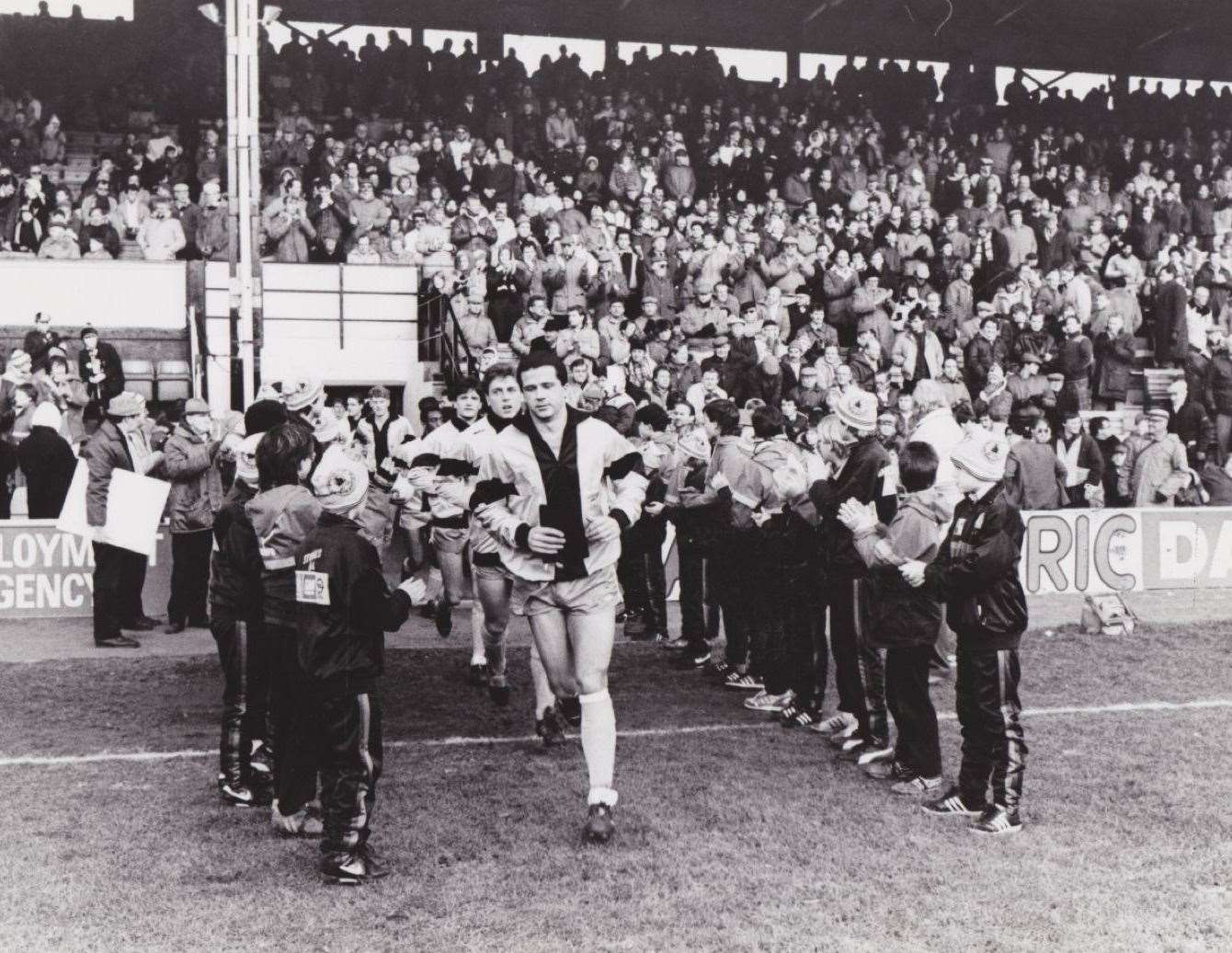 Maidstone United take to the field for their FA Cup third-round tie at Watford in January 1987.