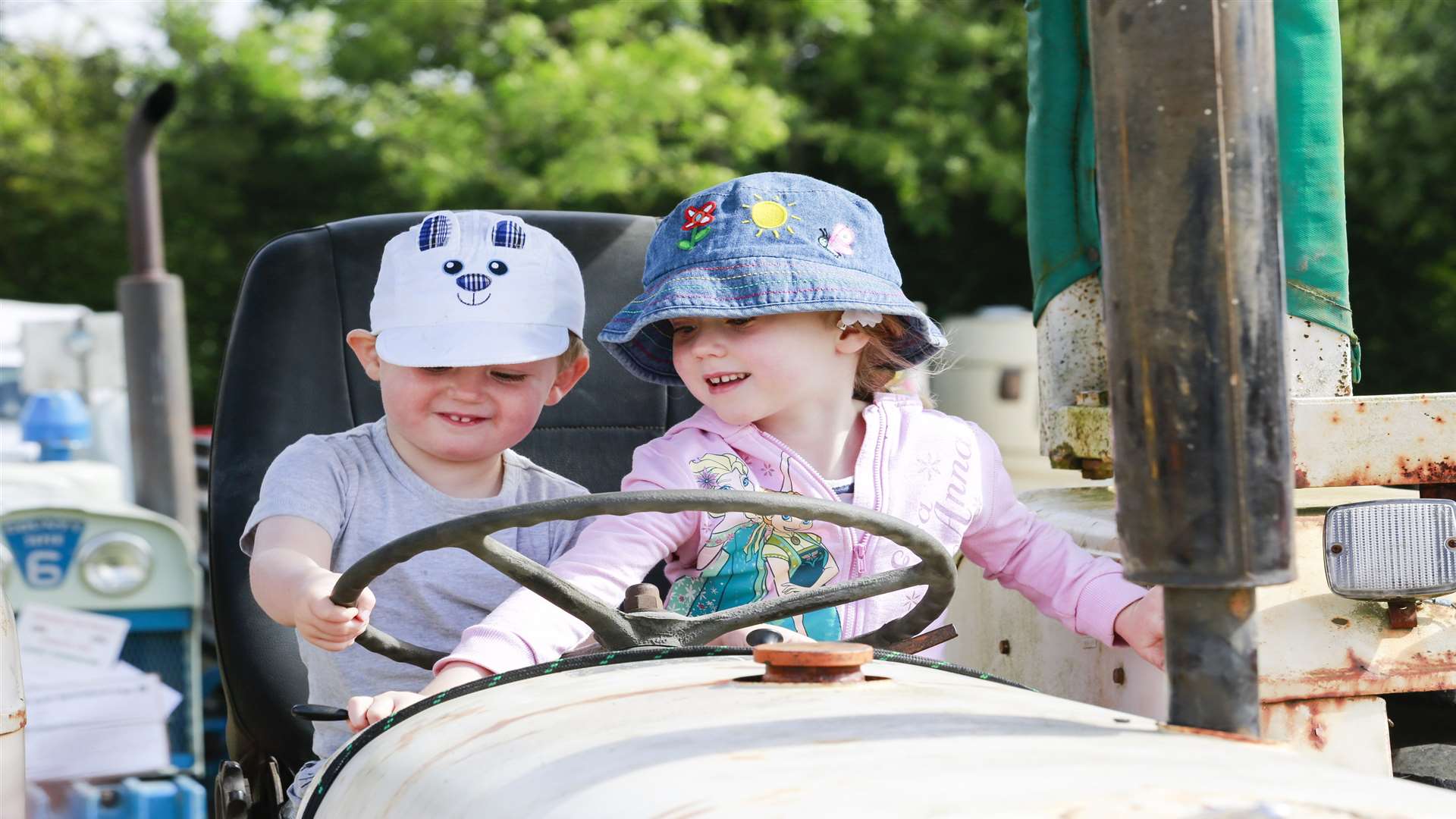 There will be plenty of farming machines to discover at the Tractorfest, as Kade and Rose Ash found out last year. Picture: Martin Apps