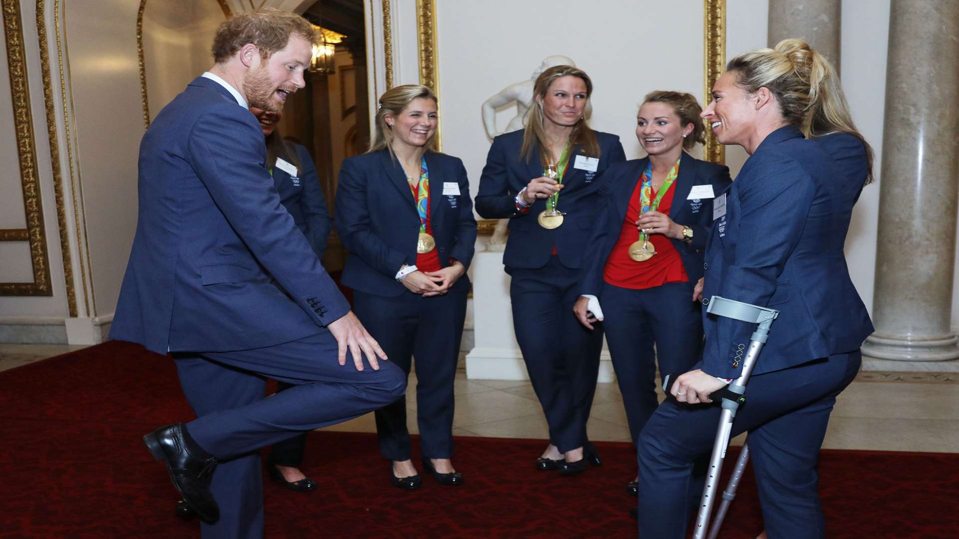 Prince Harry with Susannah Townsend and the GB Hockey heroes. Picture: Yui Mok/PA Wire