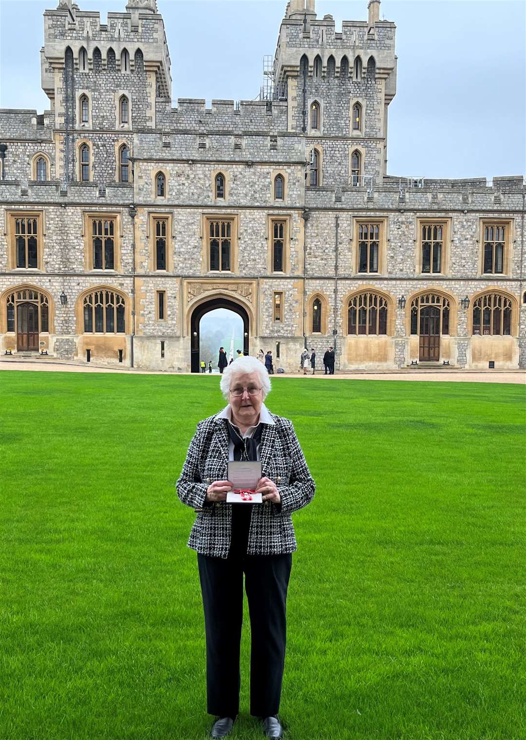 Eunice Norman at Windsor Castle after receiving her MBE medal from Prince William